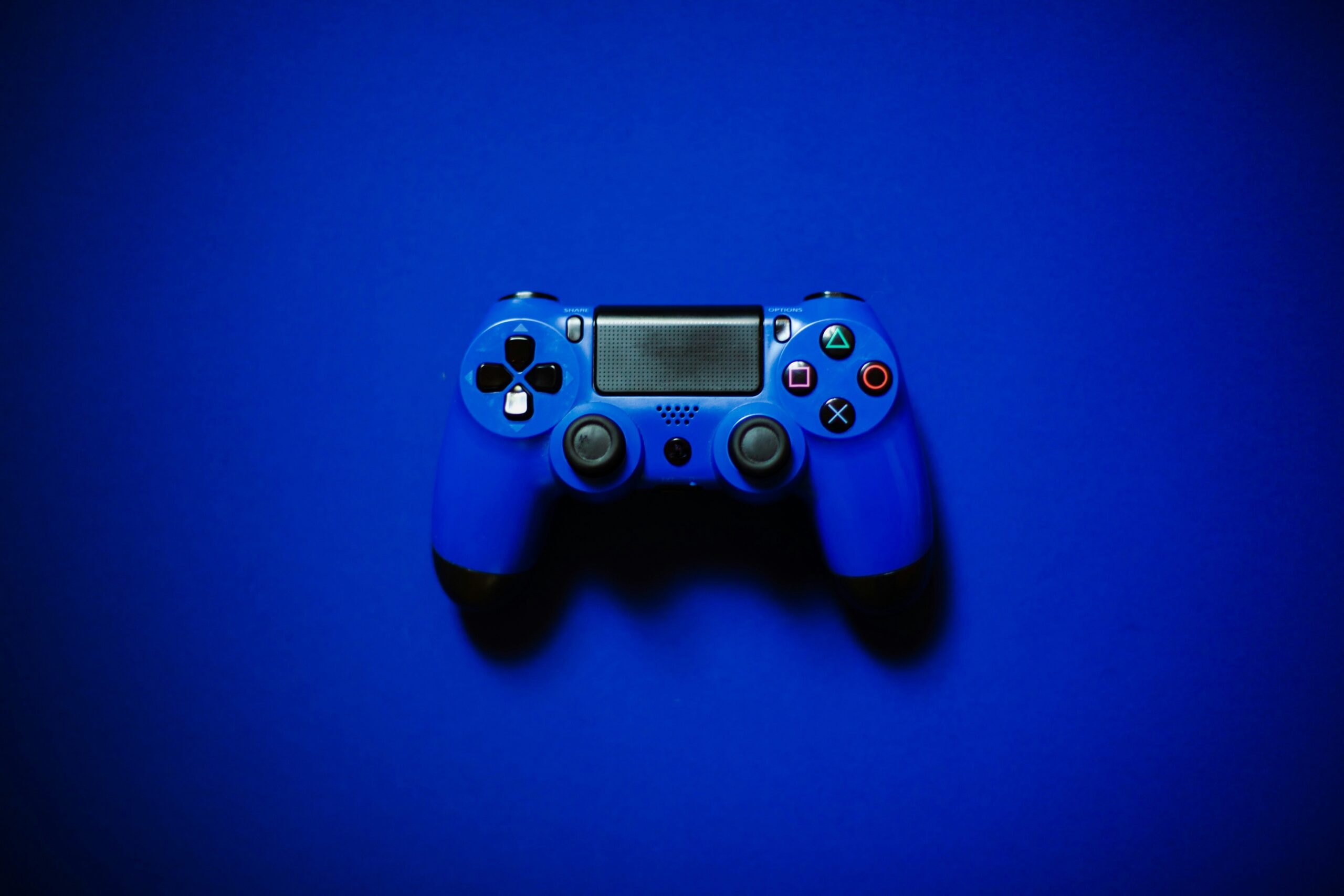 blue sony ps 4 game controller